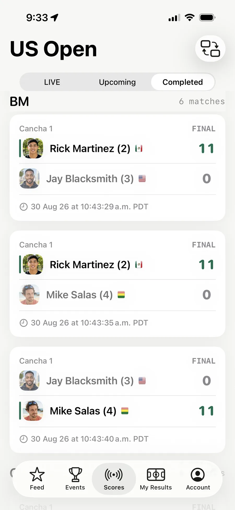 The same event's Completed tab in the AirScoreboard app, finished matches with their final scores and the time each one ended.